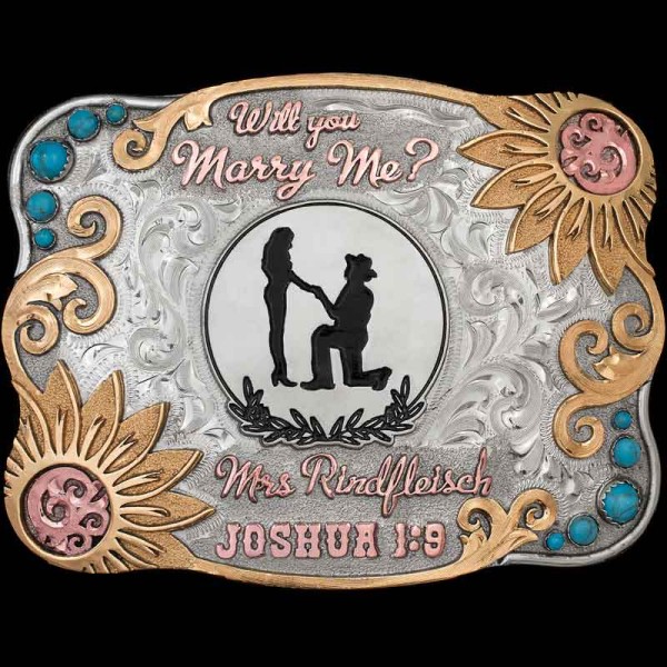 "Any Cowgirl will say ""I do!"" when you propose with this stunnin' Custom Buckle. Our Dripping Springs buckle features a hand engraved base with a natural finish. It is detailed with Jewler's Bronze overlays, Copper details in th